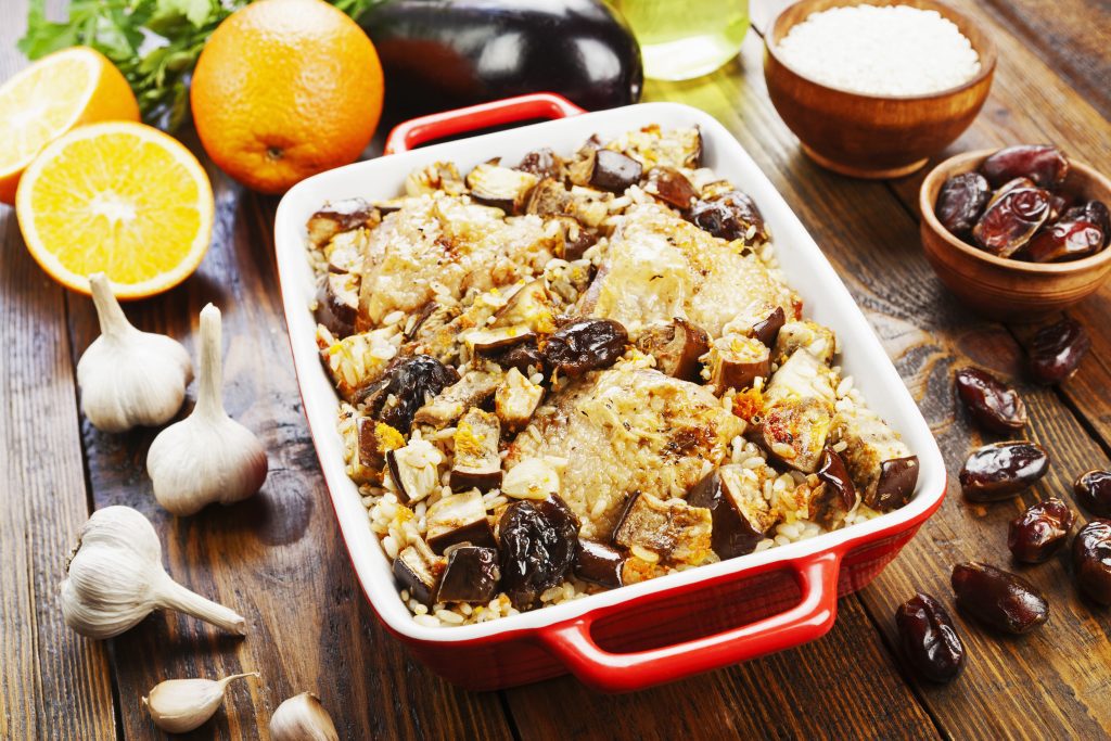 Chicken thigh baked with rice, eggplant and figs