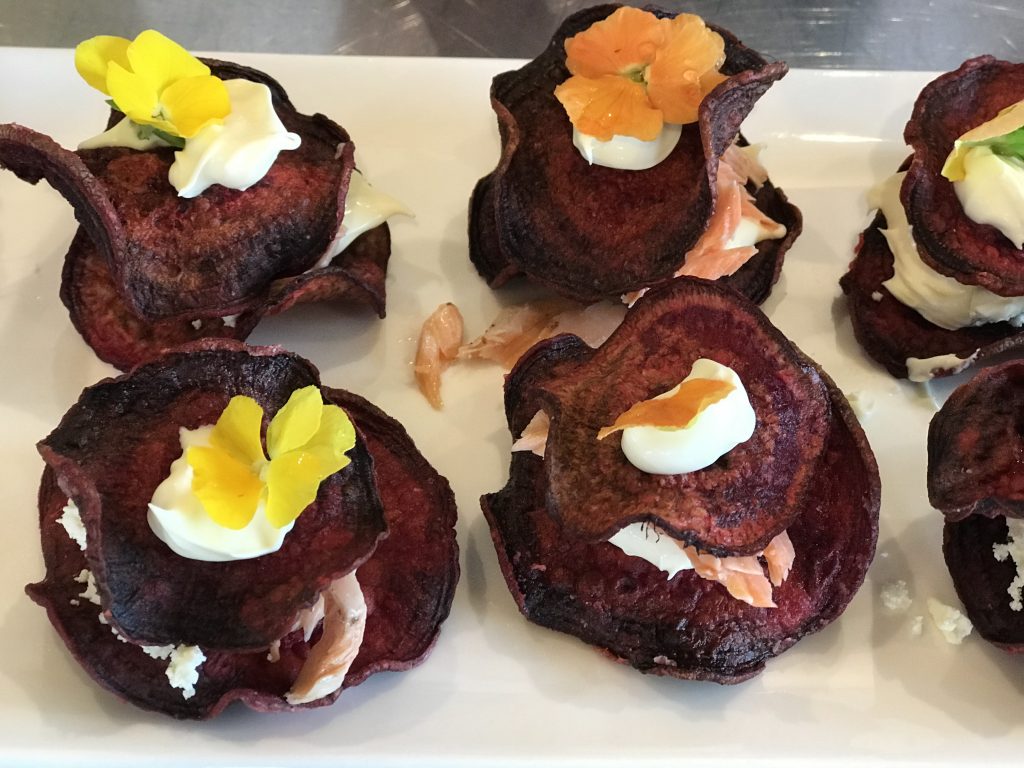 Plating the fresh snapper ceviche and white fish fritters