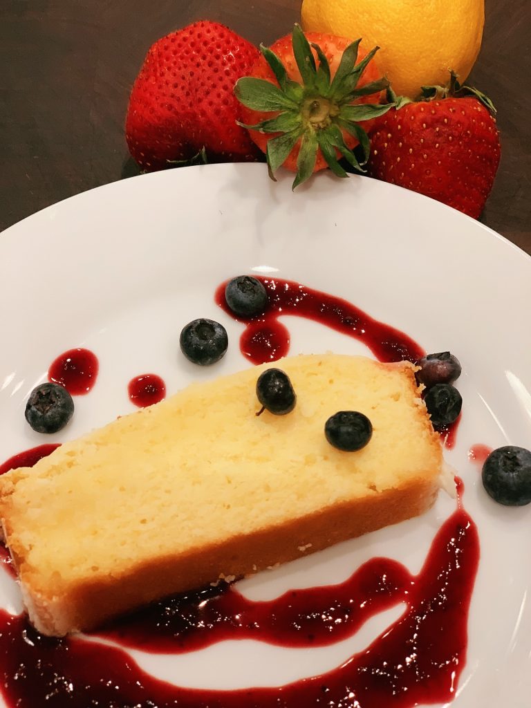 glazed lemon cake with berry sauce