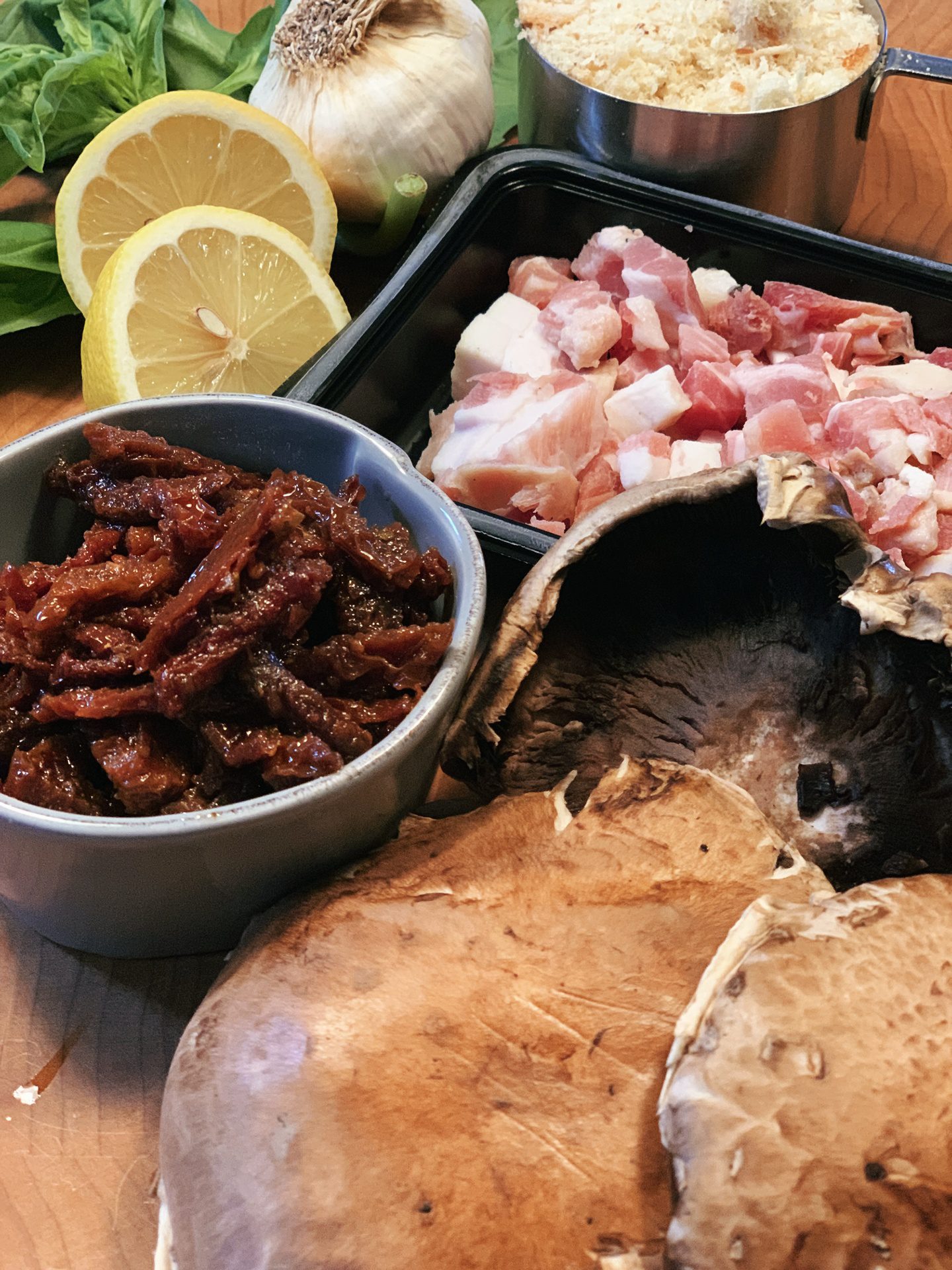 Beautifully grilled portobello mushrooms topped with sun-dried tomatoes and pancetta