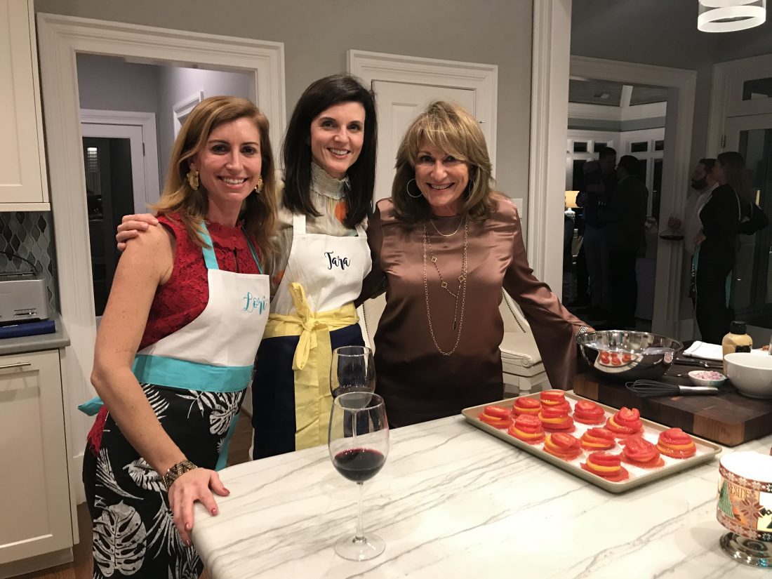 Jorj laughing with her guest chefs.