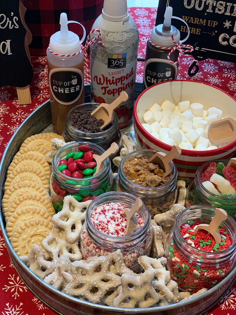 A decadent Hot Chocolate Bar spread set up for the Merry Making Movement